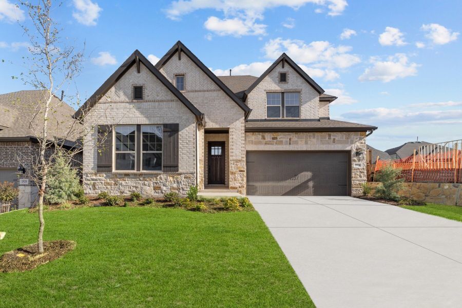 Representative exterior photo of a completed home built from the The Walmsley by David Weekley Homes in Treeline, Justin, TX (Image 2).