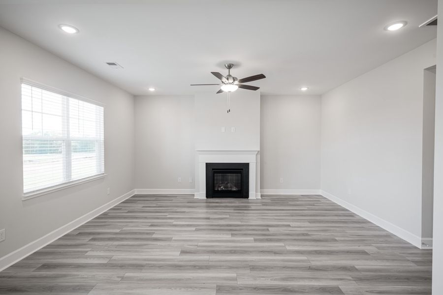 Representative unfurnished interior of a home built from the The Holland by Cothran Homes in Holly Ridge, Greenville (Image 17).