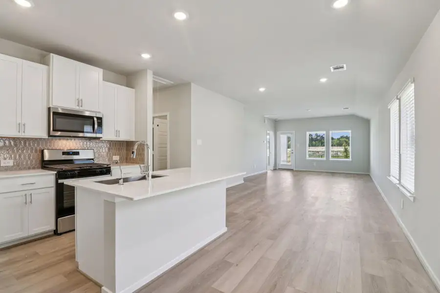 Furnished interior view inside a new home in , Conroe (Image 8). Furnished interior view inside a new home in , Conroe (Image 8).