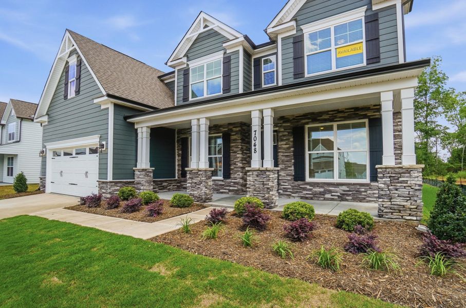 Front exterior of a new home in Harmony, Harrisburg, NC, highlighting curb appeal (Image 19). Front exterior of a new home in Harmony, Harrisburg, NC, highlighting curb appeal (Image 19).