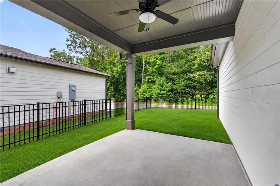 Exterior details and patio area of a home in Marble Tree, Ball Ground (Image 4).