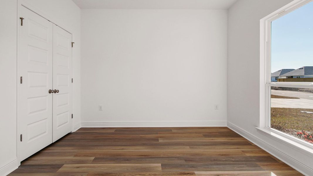 Spacious, unfurnished interior of a new home in Bayside at Ward Creek, Panama City Beach (Image 26).