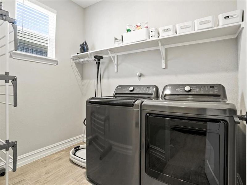 Laundry day just got an upgrade with this tucked-away, full-size setup. Laundry day just got an upgrade with this tucked-away, full-size setup.