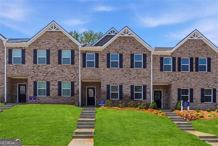 Front exterior of a new home in Parkway James, Snellville, GA, highlighting curb appeal (Image 17).