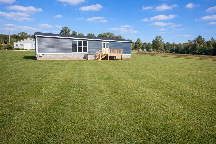Exterior details and patio area of a home in , Harleyville (Image 3).