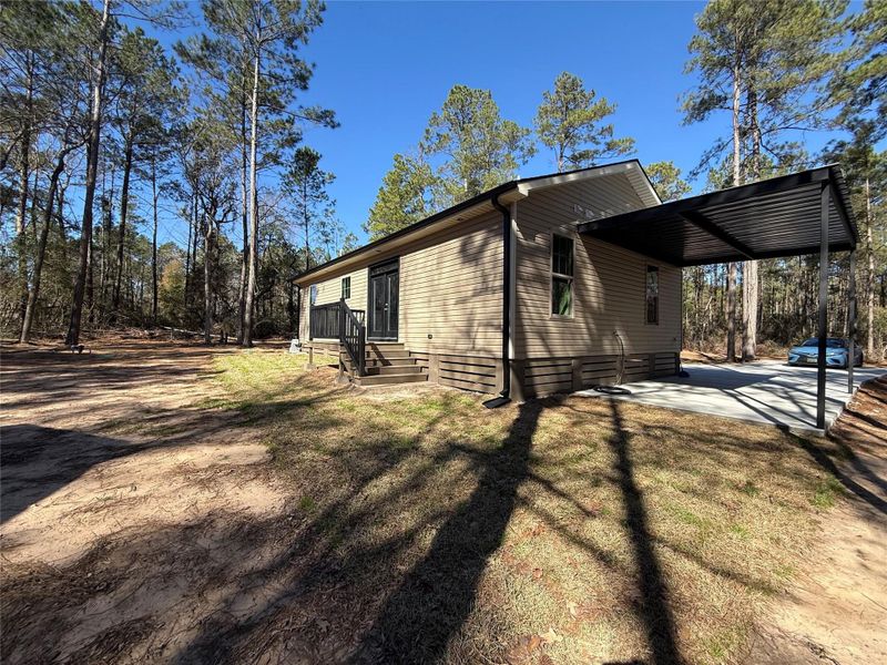 Exterior details and patio area of a home in , Plantersville (Image 26). Exterior details and patio area of a home in , Plantersville (Image 26).
