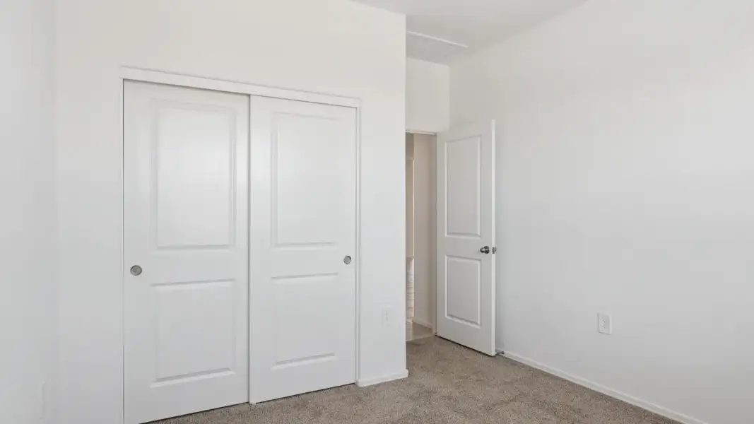 Spacious, unfurnished interior of a new home in Heartland Ranch, Coolidge (Image 19).