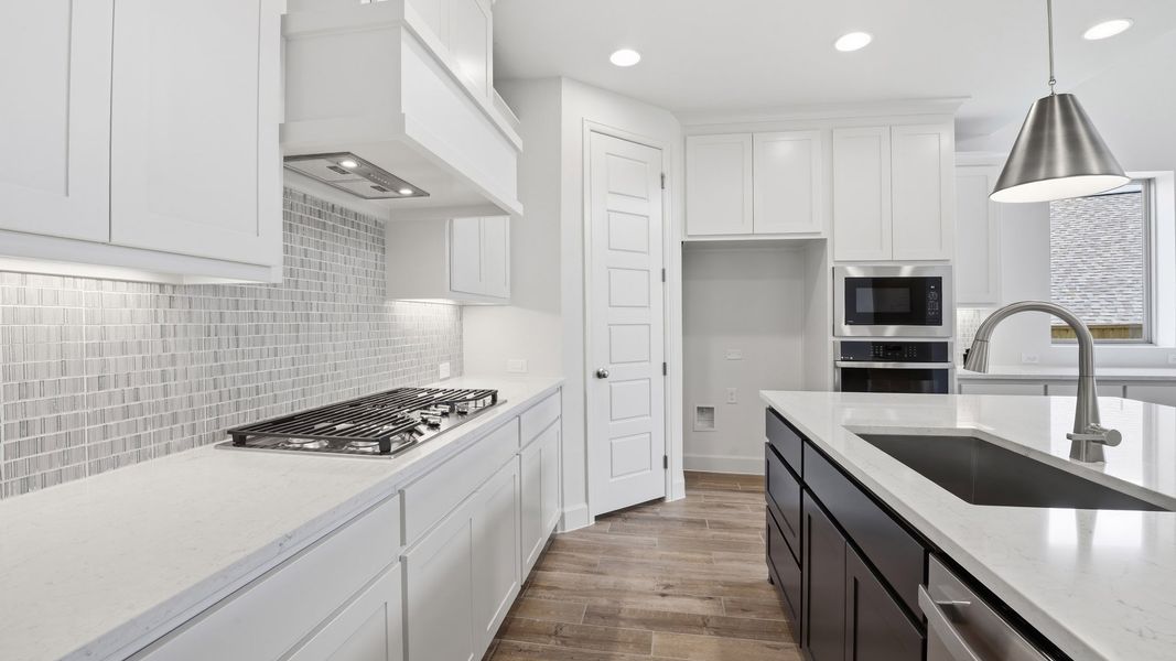 Furnished interior view inside a new home in The Heights at Uptown Celina, Celina (Image 11).