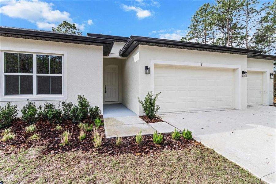 Front exterior of a new home in , Homosassa, FL, highlighting curb appeal (Image 18).