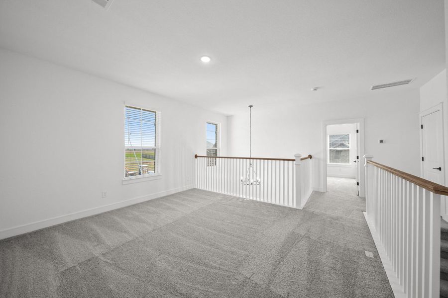 Versatile loft upstairs (*Photo not of actual home and used for illustration purposes only.) Versatile loft upstairs (*Photo not of actual home and used for illustration purposes only.)