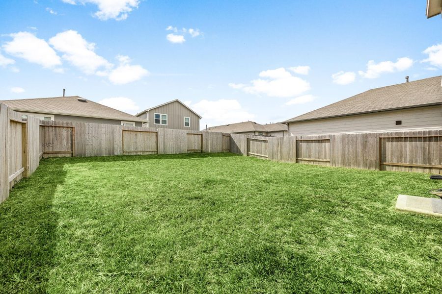 Front exterior of a new home in Decker Farms, Magnolia, TX, highlighting curb appeal (Image 18). Front exterior of a new home in Decker Farms, Magnolia, TX, highlighting curb appeal (Image 18).