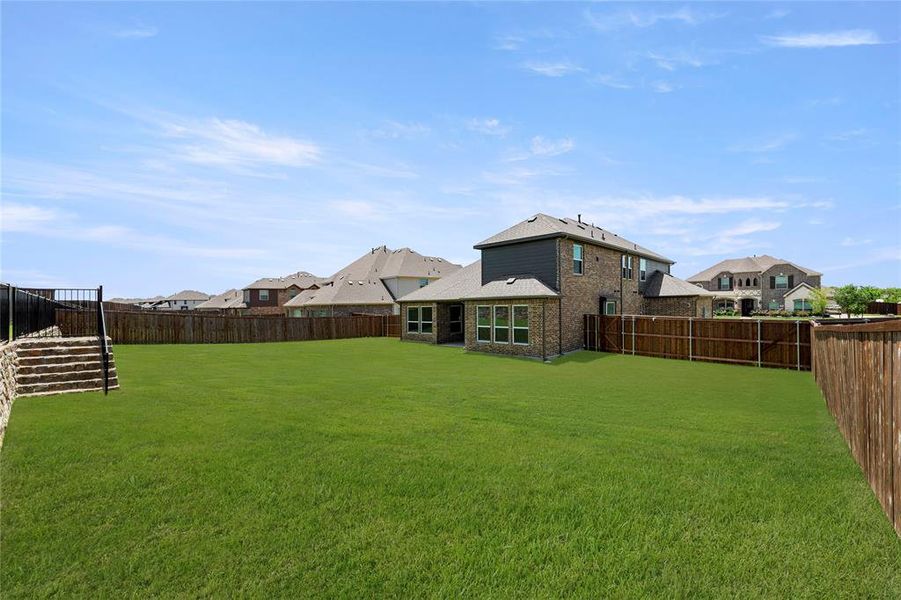 Exterior details and patio area of a home in Grayhawk Addition, Forney (Image 20).