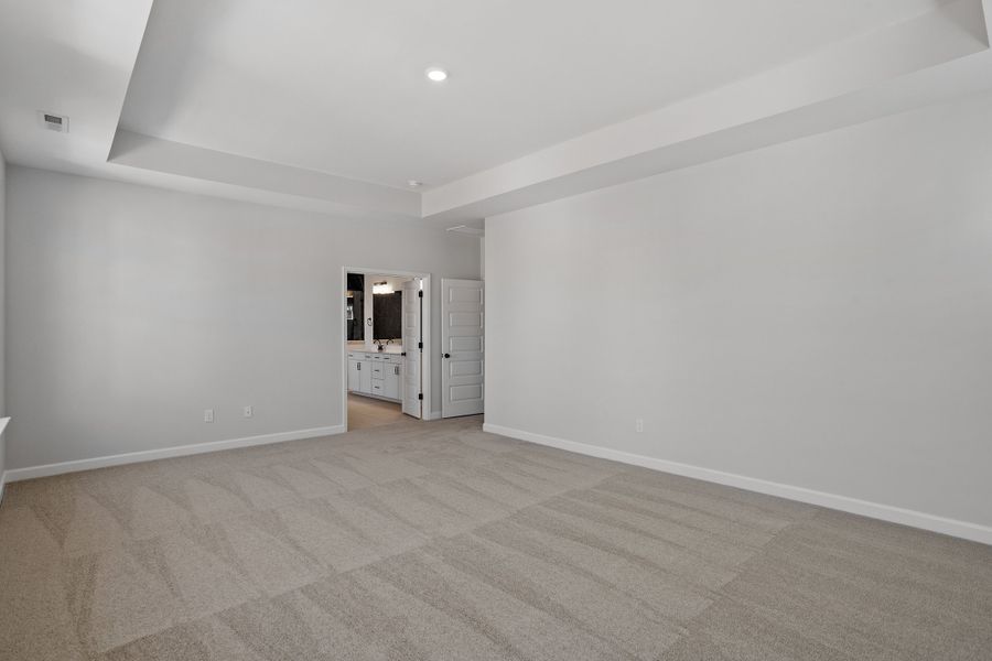 Spacious, unfurnished interior of a new home in Sweetbrier, Durham (Image 31).