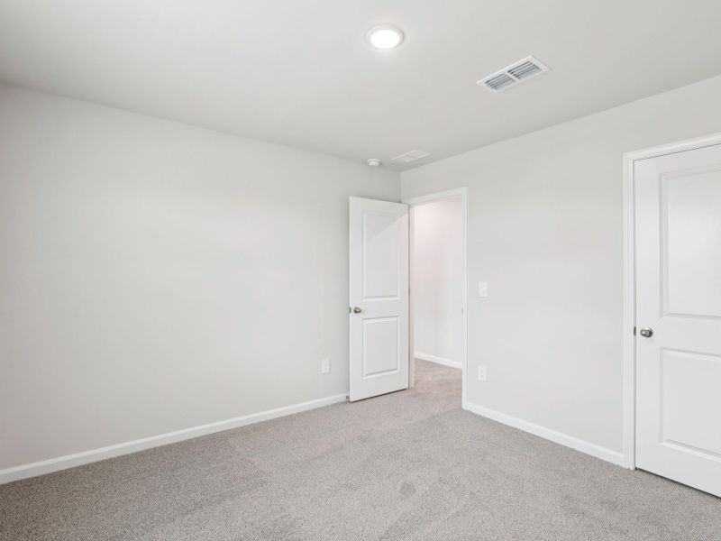 Spacious, unfurnished interior of a new home in River Glen, Angier (Image 17).