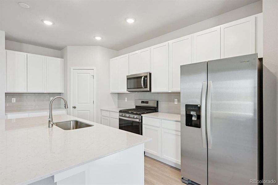 Furnished interior view inside a new home in Sweetgrass, Dacono (Image 11).