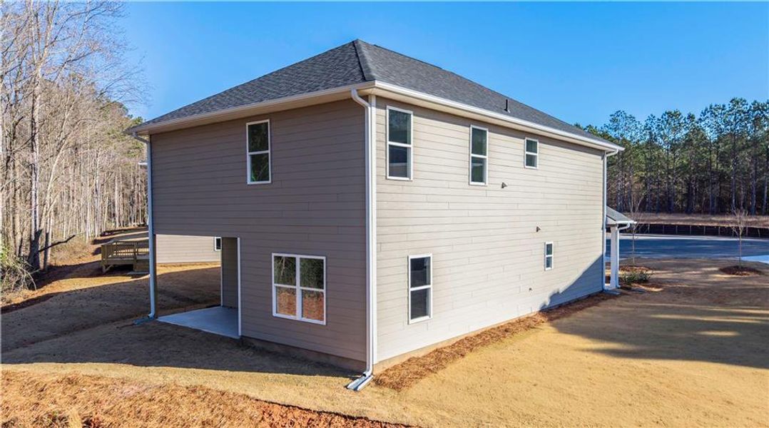 Exterior details and patio area of a home in Canterbury Villas, Carrollton (Image 3).