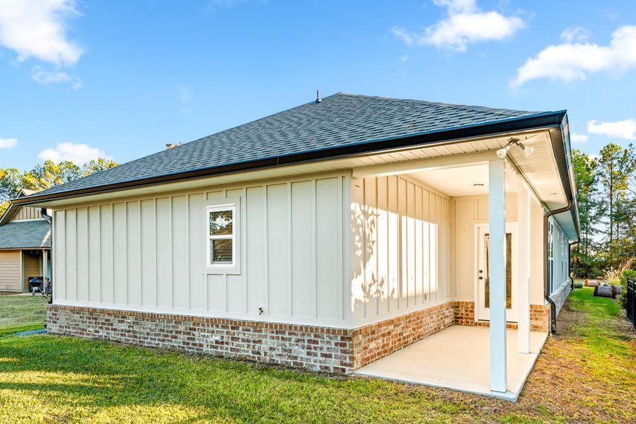 Exterior details and patio area of a home in Crescent and Symphony at Hammock Bay, Freeport (Image 3). Exterior details and patio area of a home in Crescent and Symphony at Hammock Bay, Freeport (Image 3).