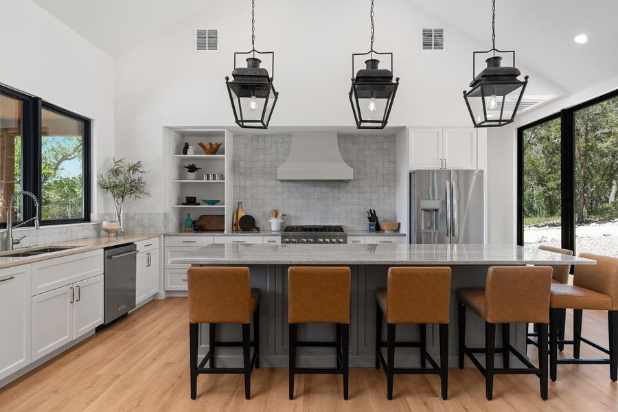 This is a TO BE BUILT custom home on 6.75 acres in Rainbow Ranch, Wimberley TX.