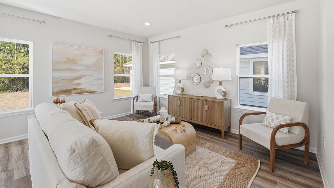 Representative furnished interior of a home built from the The Monroe by D.R. Horton in Chateau Nemours, Port Saint Joe (Image 17).