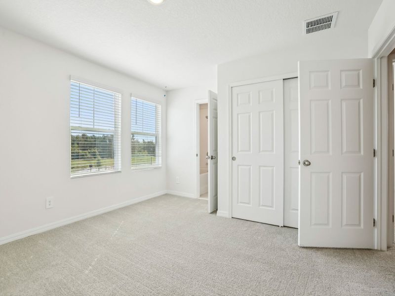 Spacious, unfurnished interior of a new home in The Meadow at Crossprairie Townes, St. Cloud (Image 11).