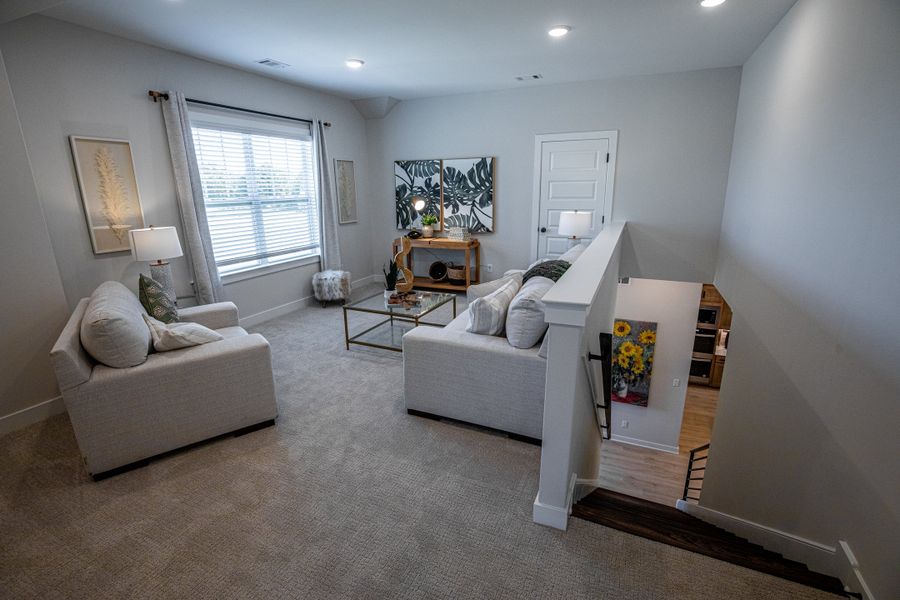 Representative furnished interior of a home built from the Willow by Grant & Co in Manor at Hall Creek, Arlington (Image 88).