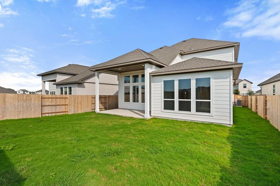 Front exterior of a new home in Arbor Collection At Park Central, Georgetown, TX, highlighting curb appeal (Image 2). Front exterior of a new home in Arbor Collection At Park Central, Georgetown, TX, highlighting curb appeal (Image 2).