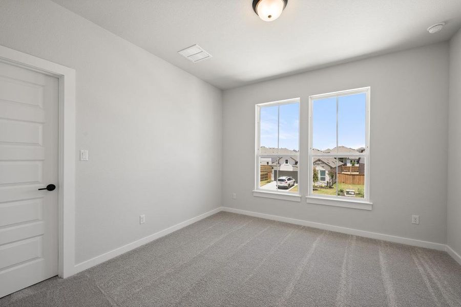 Spacious, unfurnished interior of a new home in Heritage, Dripping Springs (Image 24).