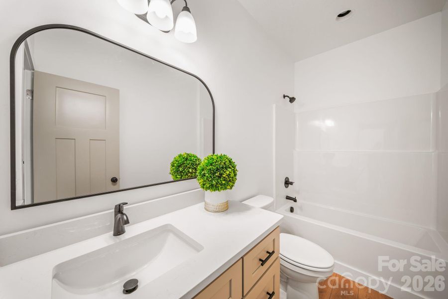 Furnished interior view inside a new home in , Waynesville (Image 14).