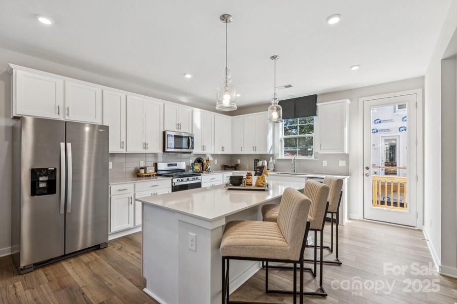 Furnished interior view inside a new home in , Huntersville (Image 9).