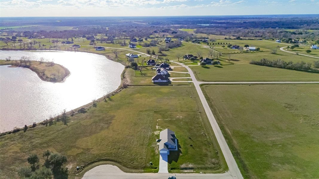 Front exterior of a new home in , Rosharon, TX, highlighting curb appeal (Image 2). Front exterior of a new home in , Rosharon, TX, highlighting curb appeal (Image 2).