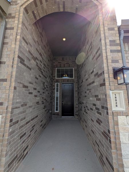 Exterior details and patio area of a home in Artavia, Conroe (Image 3).