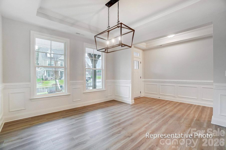 Example of a dining room with tray ceiling