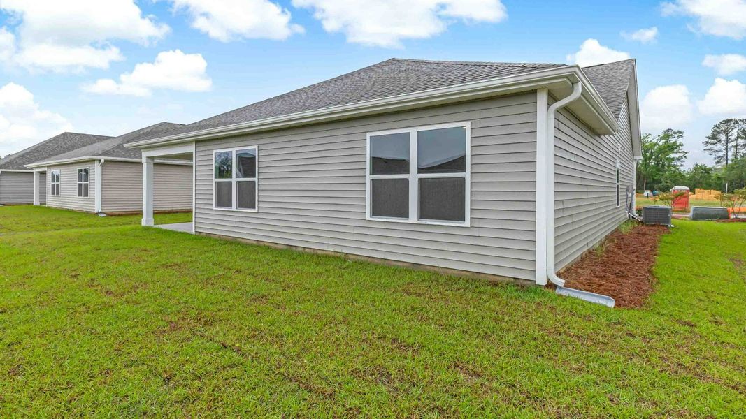 Representative exterior photo of a completed home built from the CALI by D.R. Horton in Eagle Creek, Bolivia, NC (Image 17). Representative exterior photo of a completed home built from the CALI by D.R. Horton in Eagle Creek, Bolivia, NC (Image 17).