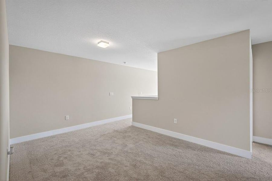 Spacious, unfurnished interior of a new home in Gray Hawk at Hole Two, Daytona Beach (Image 53).