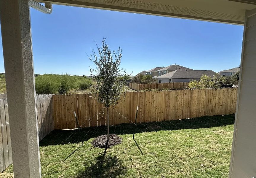 Exterior details and patio area of a home in Porter Country, Buda (Image 14).