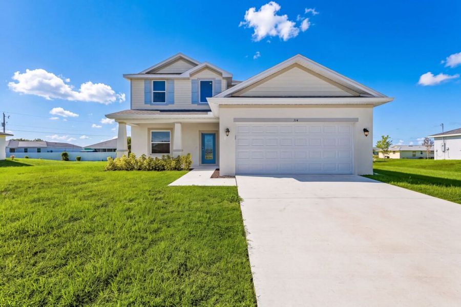 Front exterior of a new home in Cape Coral, Cape Coral, FL, highlighting curb appeal (Image 18). Front exterior of a new home in Cape Coral, Cape Coral, FL, highlighting curb appeal (Image 18).