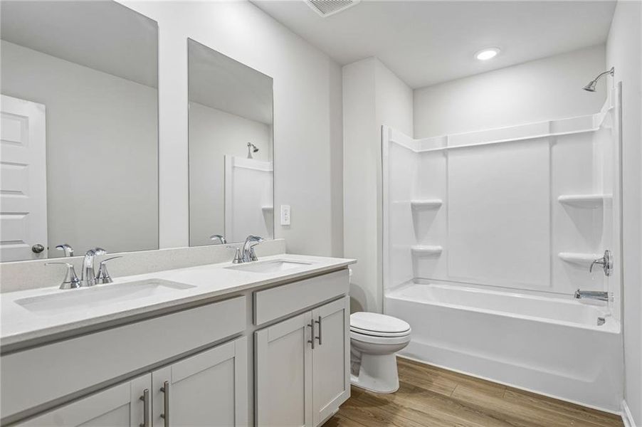 Furnished interior view inside a new home in Martin Springs - Estate Series, Lawrenceville (Image 12).