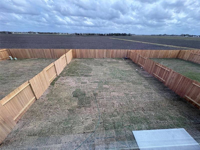 Exterior details and patio area of a home in Vacek Pointe, Richmond (Image 3).