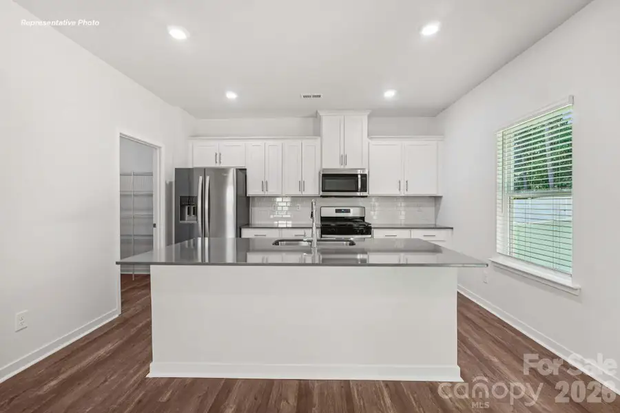 Furnished interior view inside a new home in Reedy Creek Preserve, Charlotte (Image 6).