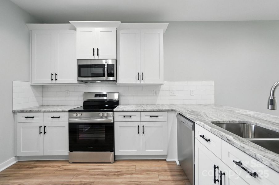 Furnished interior view inside a new home in , Hickory (Image 14).