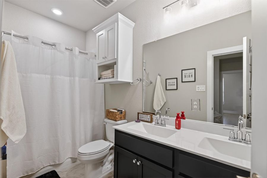 Furnished interior view inside a new home in Lone Star Landing, Montgomery (Image 38).