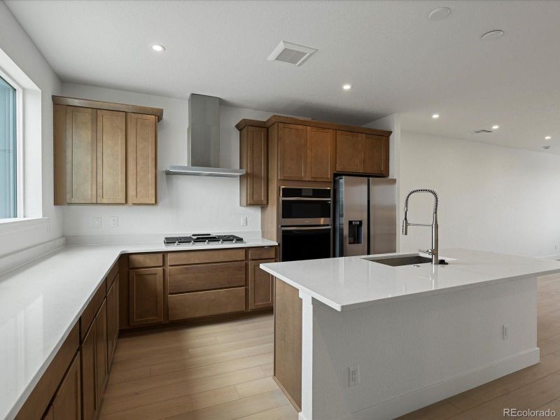 Furnished interior view inside a new home in Ascent at Inverness, Englewood (Image 5).