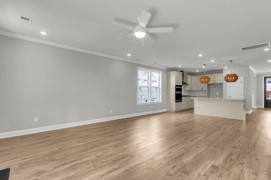 Spacious, unfurnished interior of a new home in Tidewater at Lakes of Cane Bay, Summerville (Image 25).