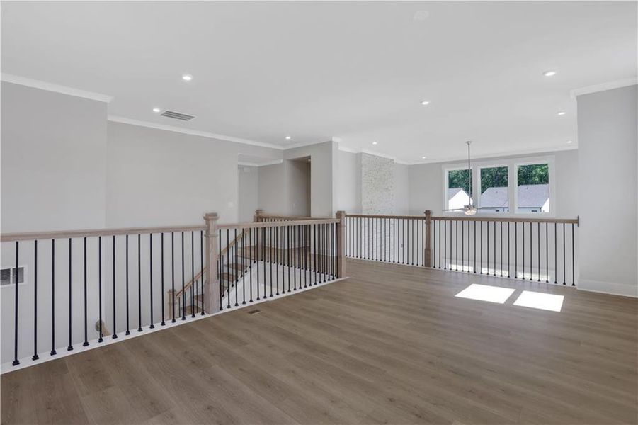 Spacious, unfurnished interior of a new home in The Paddocks at Doc Hughes, Buford (Image 20).