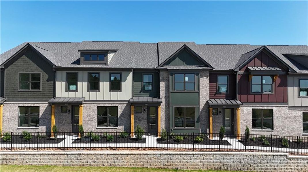 Front exterior of a new home in Tribute, Hoschton, GA, highlighting curb appeal (Image 1). Front exterior of a new home in Tribute, Hoschton, GA, highlighting curb appeal (Image 1).