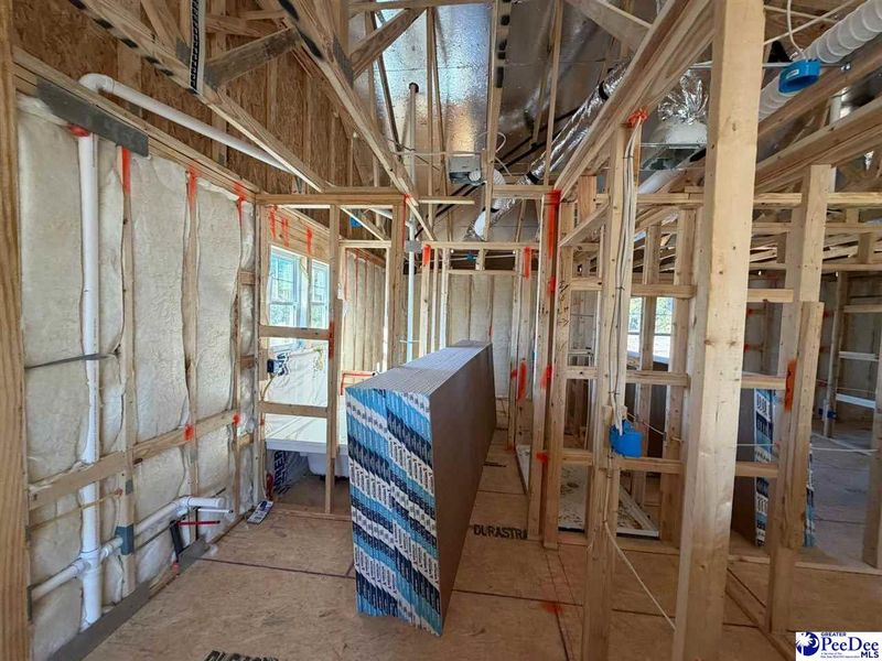 In-progress construction of a new home in The Grove, Florence, SC (Image 16).