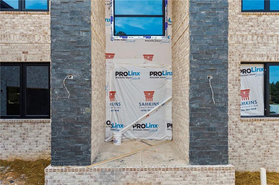 Front exterior of a new home in , Fairburn, GA, highlighting curb appeal (Image 27).