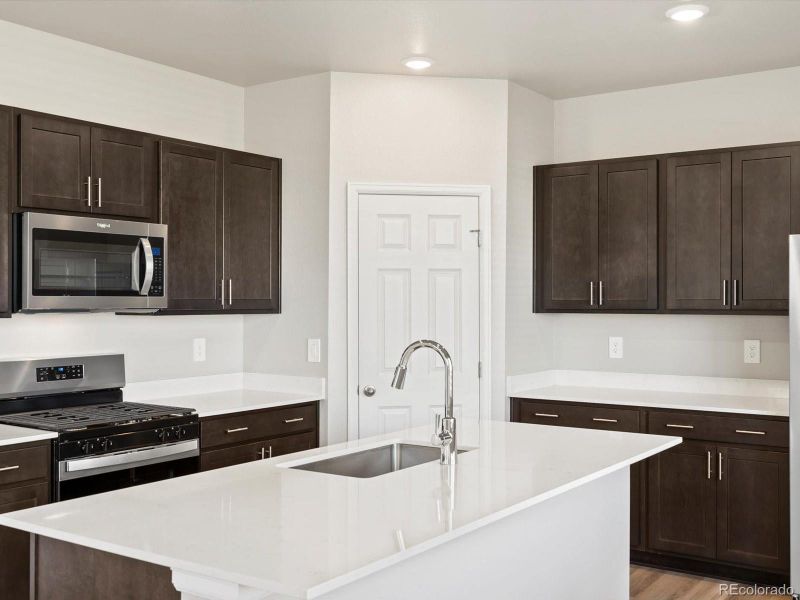Furnished interior view inside a new home in Revere at Johnstown, Johnstown (Image 11).