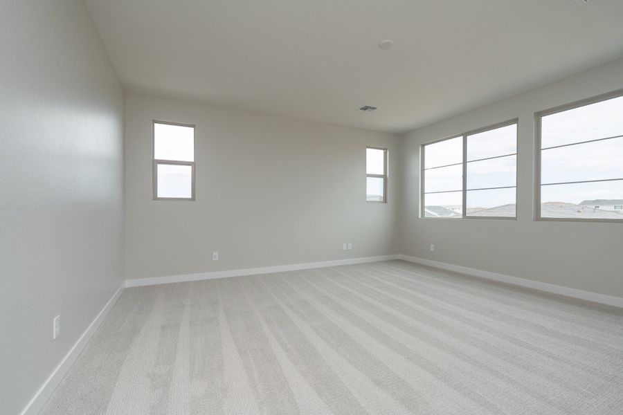 Spacious, unfurnished interior of a new home in Waterston Central, Gilbert (Image 13).