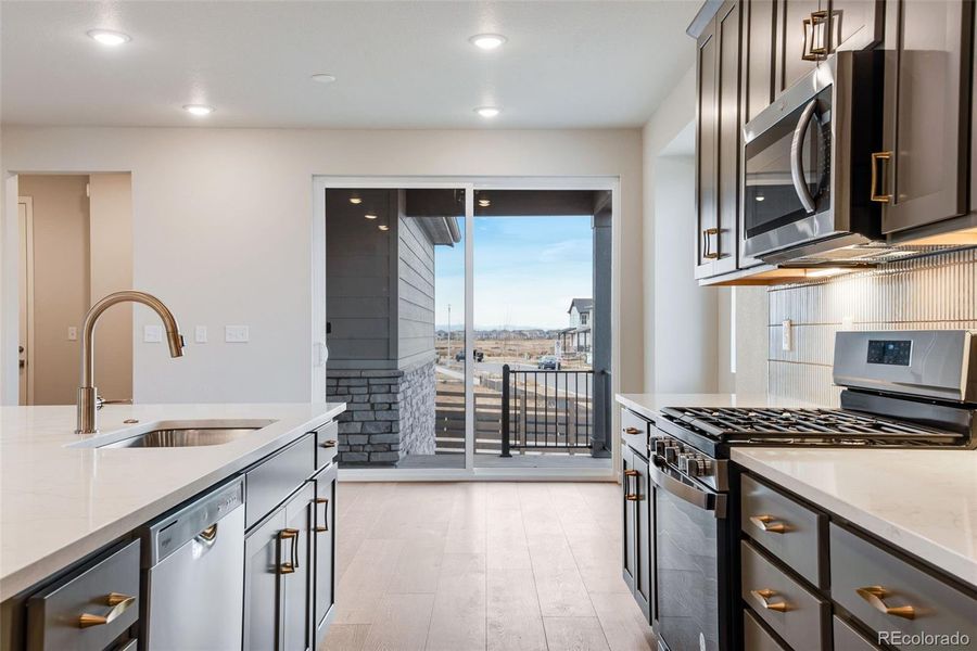Furnished interior view inside a new home in Painted Prairie, Aurora (Image 14).